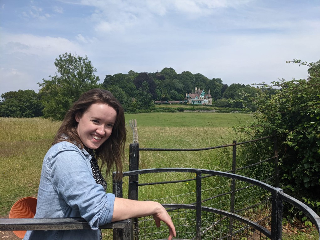 Me smiling in a field.