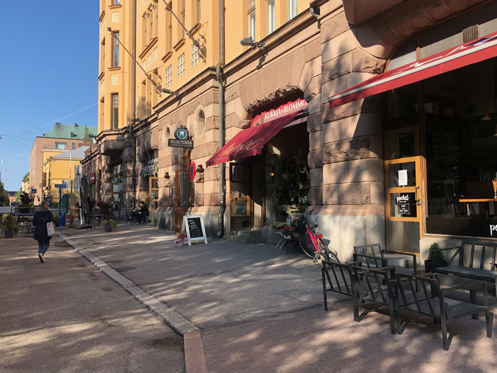 Pavement and shop windows.