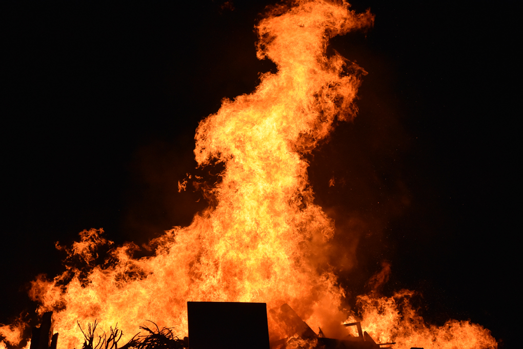 Pillar of fire from a village bonfire