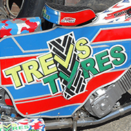 Brightly painted motorbike advertising local tyre fitting depot