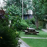 View through a gate into a courtyard