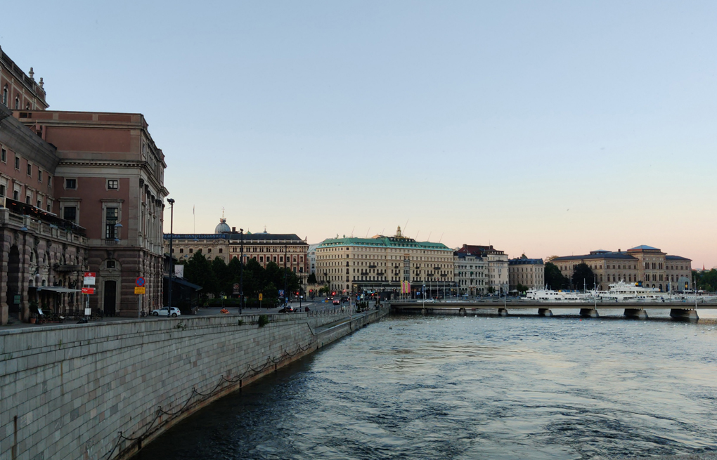 Looking East across Norrstrom at 9:45 at night, past the Opera House at the Handelsbanken head office