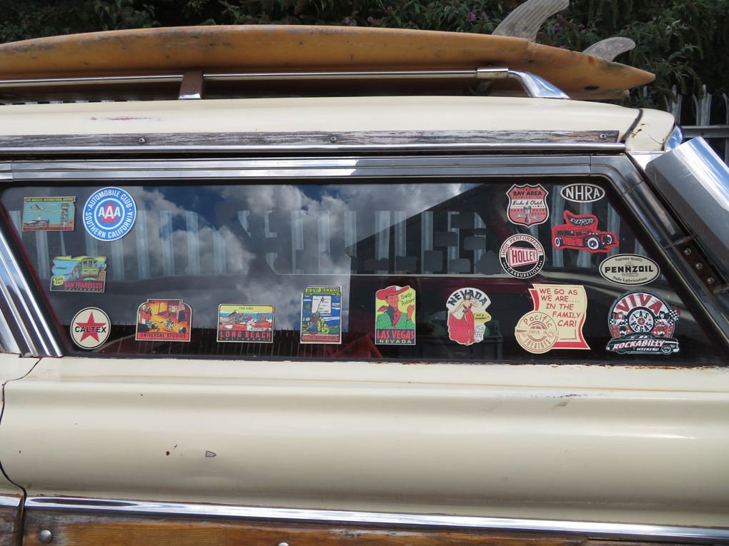We see stickers on the rear window of a 1959 Ford Edsel Villager Wagon that show its travels
