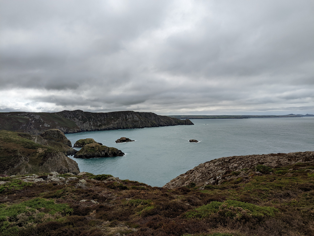 Heavy sky over a blue sea on the Pembrokeshire coast