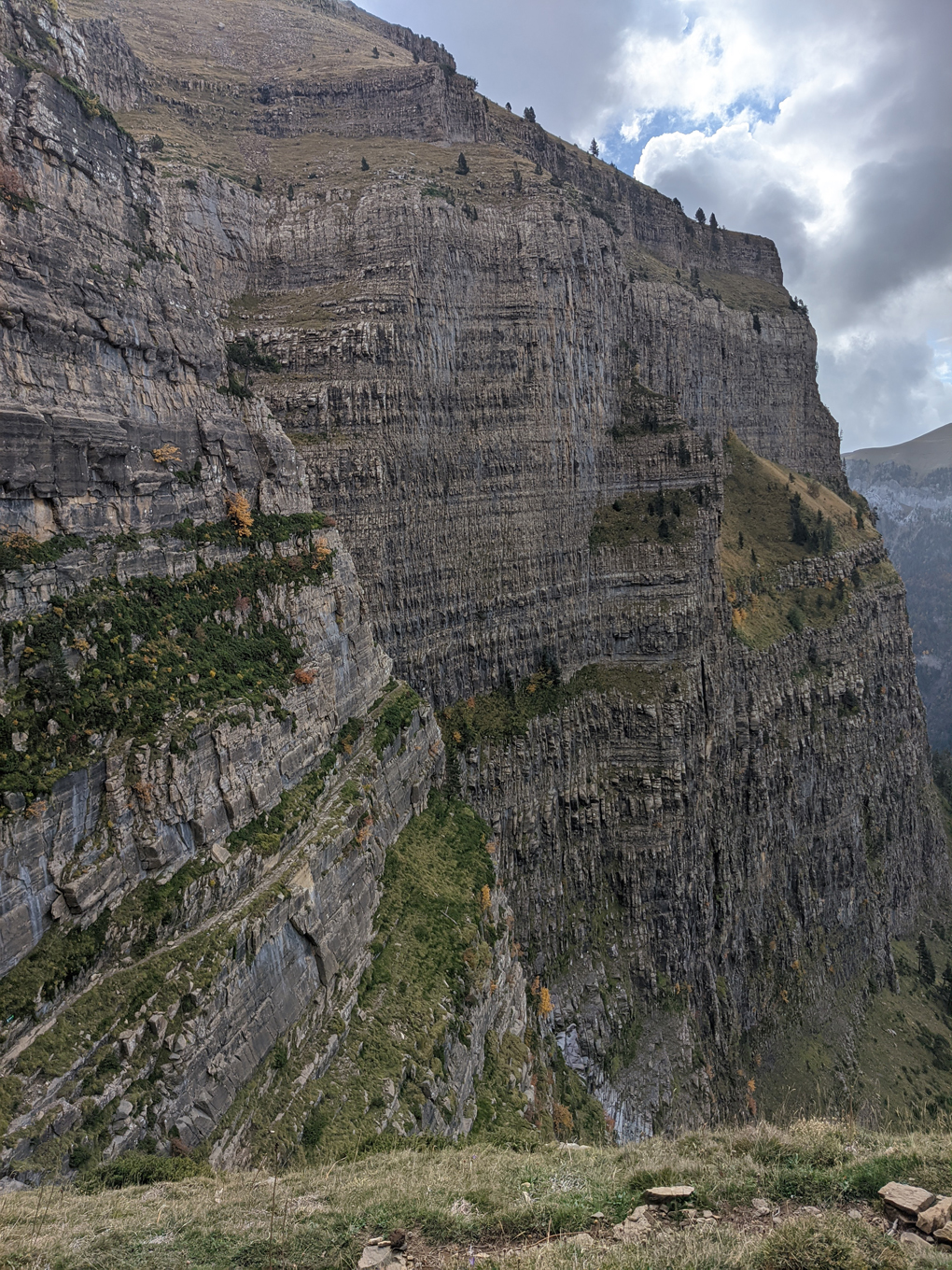 Photo looking across steep cliff faces in Ordesa National Park with path following the contour line