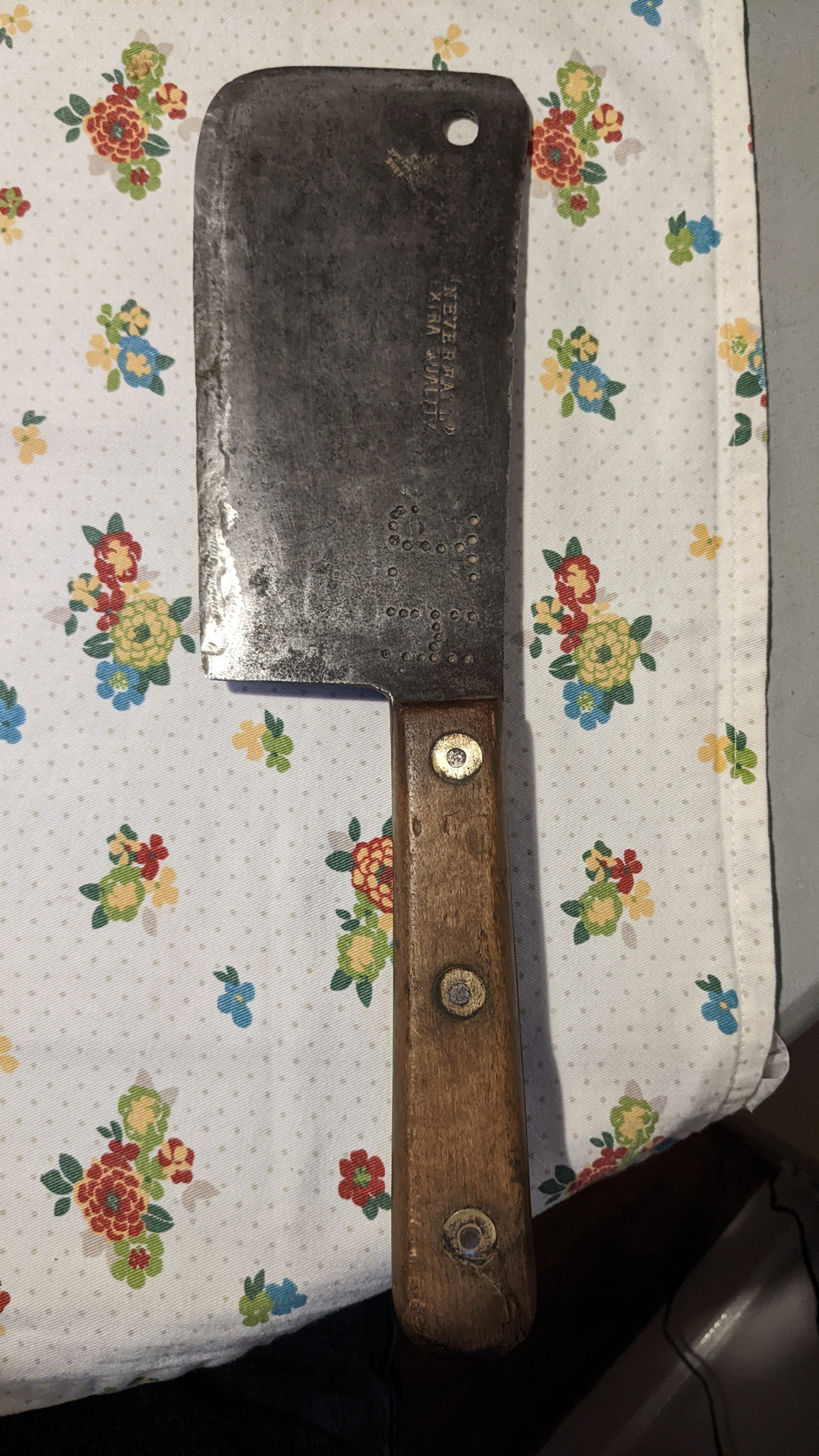 A meat cleaver with the initials 