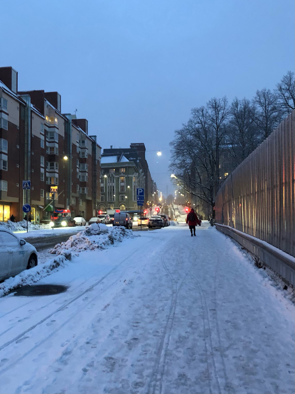 Snowy street at dusk
