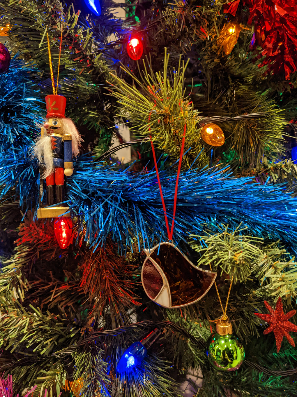 Decorations hanging from a Christmas tree