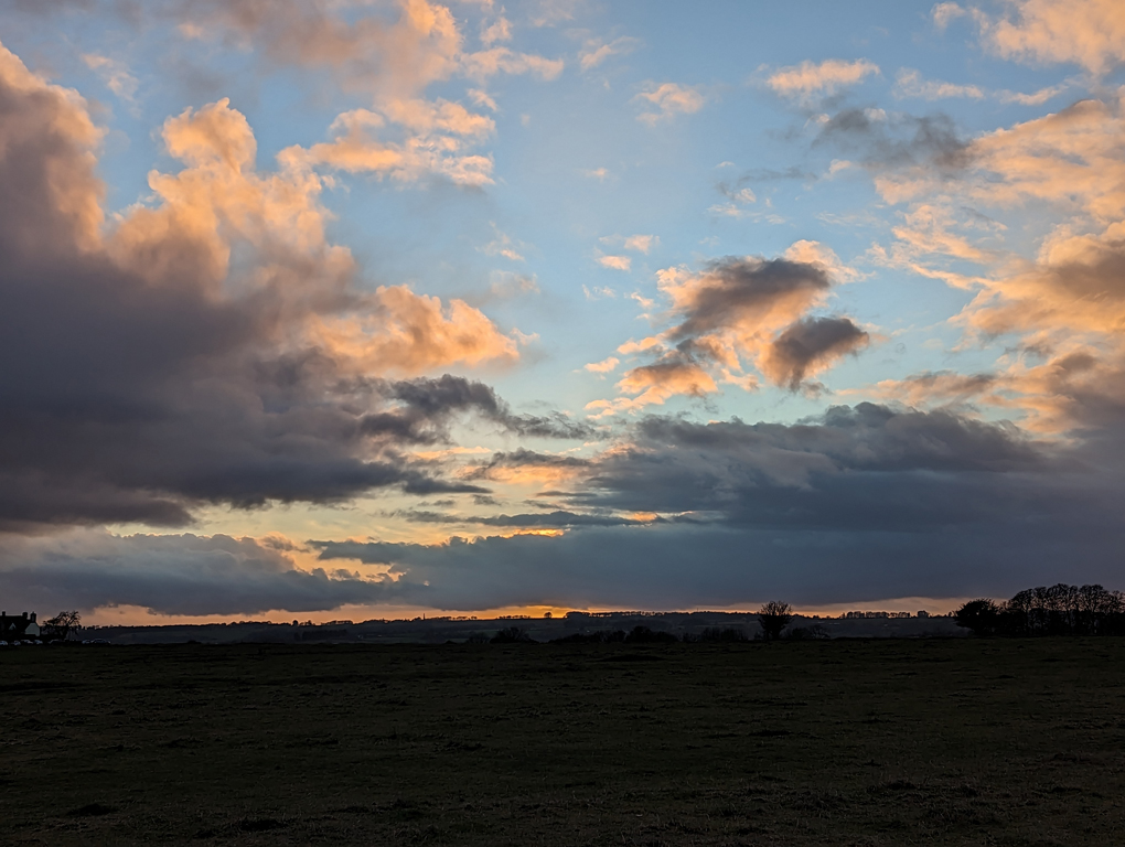 Sun setting over Minchinhampton Common