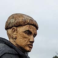 Wooden carvings of an Abbott and a Canon in Cirencester.