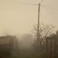 A view down a foggy alley