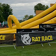 Yellow and black inflatable slide