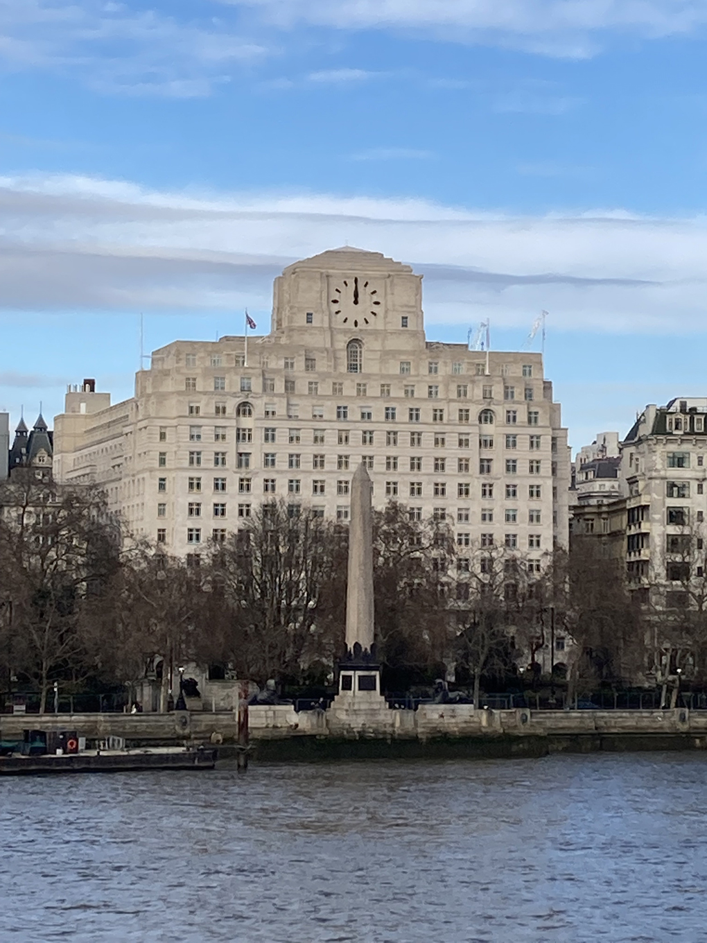 We see an Art Deco building across the Thames from South Bank inLondon