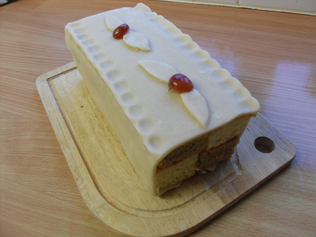 a homemade battenburg cake on a board