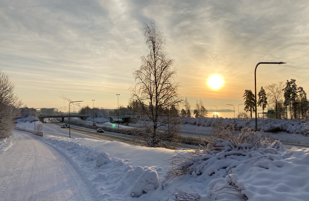 Wintery scene with a motorway and low sun.