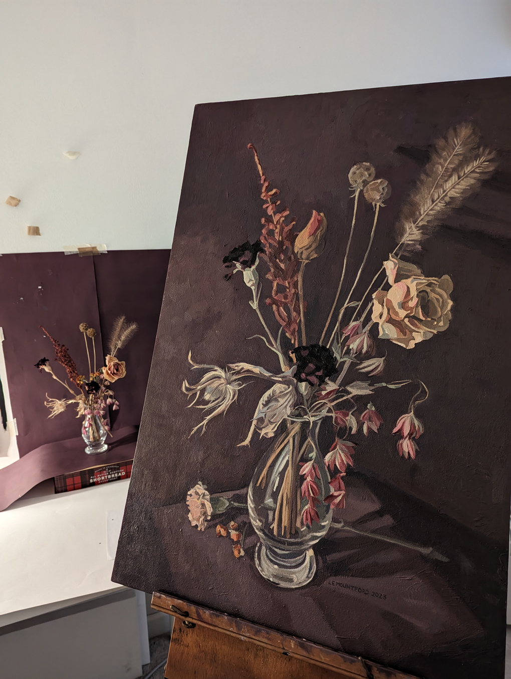 Painting of dried flowers, oil on canvas with a dark purple background, done by Lucy Mountford