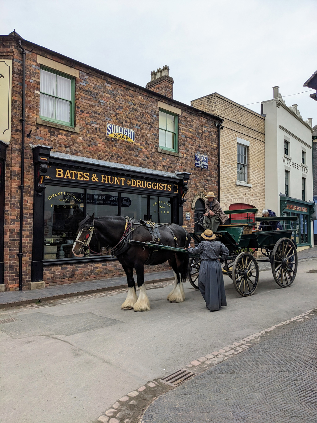 Town setting with horse drawn carriage all set in 1900.