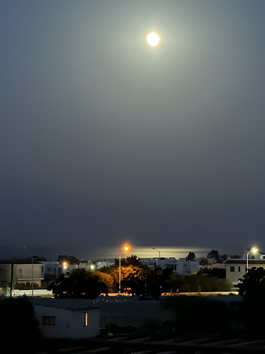 We see an unusually bright moon near Aiya Napa, Cyprus