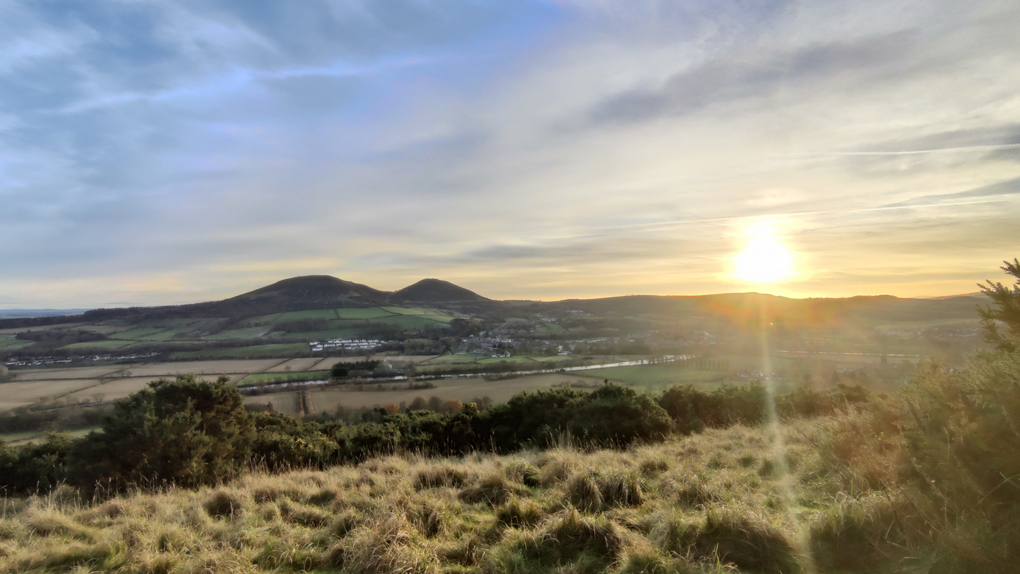 Looking over the Tweed valley towards the Eildon hills as the sun is setting