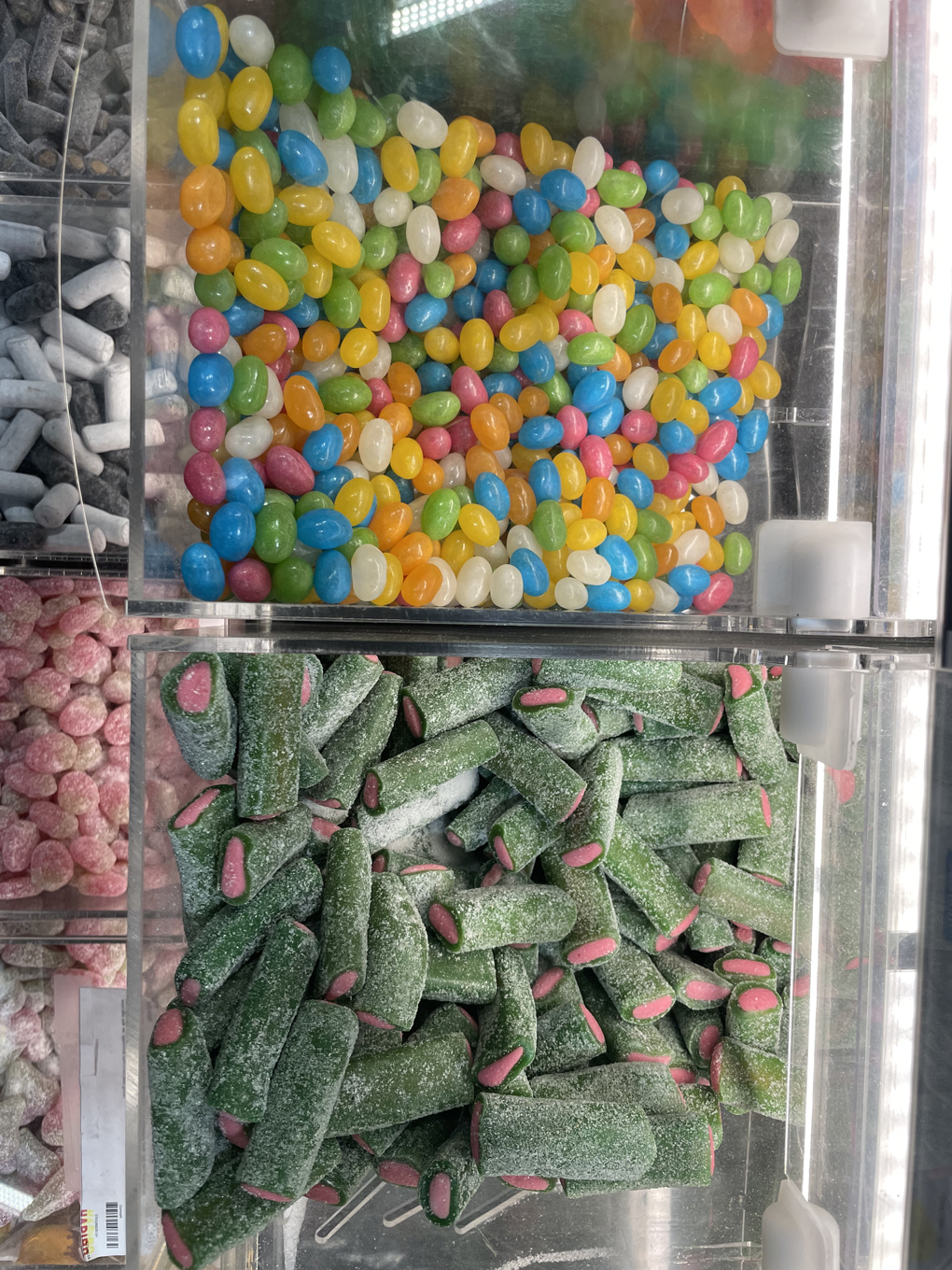 Aerial view of sweets in pick and mix containers in a supermarket