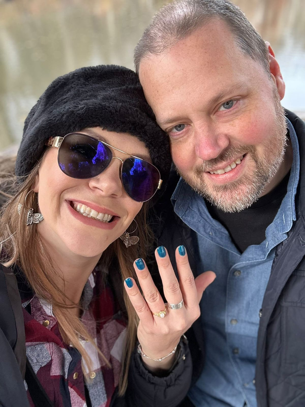 Lady showing off an engagement ring