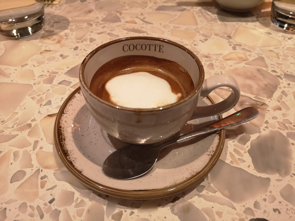 Coffee in a cup marked Cocotte.