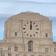 We see an Art Deco building across the Thames from South Bank inLondon