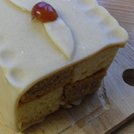 a homemade battenburg cake on a board