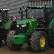 Row of tractors assembling for a parade