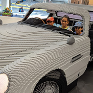 Picture of grey Aston Martin DB5 made from 357,954 bricks in the Lego London store