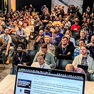 An image of the crowd from my perspective while on the stage waiting to start. My laptop is on the pedestel in front of me.