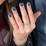 Lady showing off an engagement ring