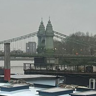 Docks with barges moored up.