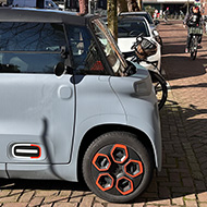 Electric miniature car and cycles in Amsterdam