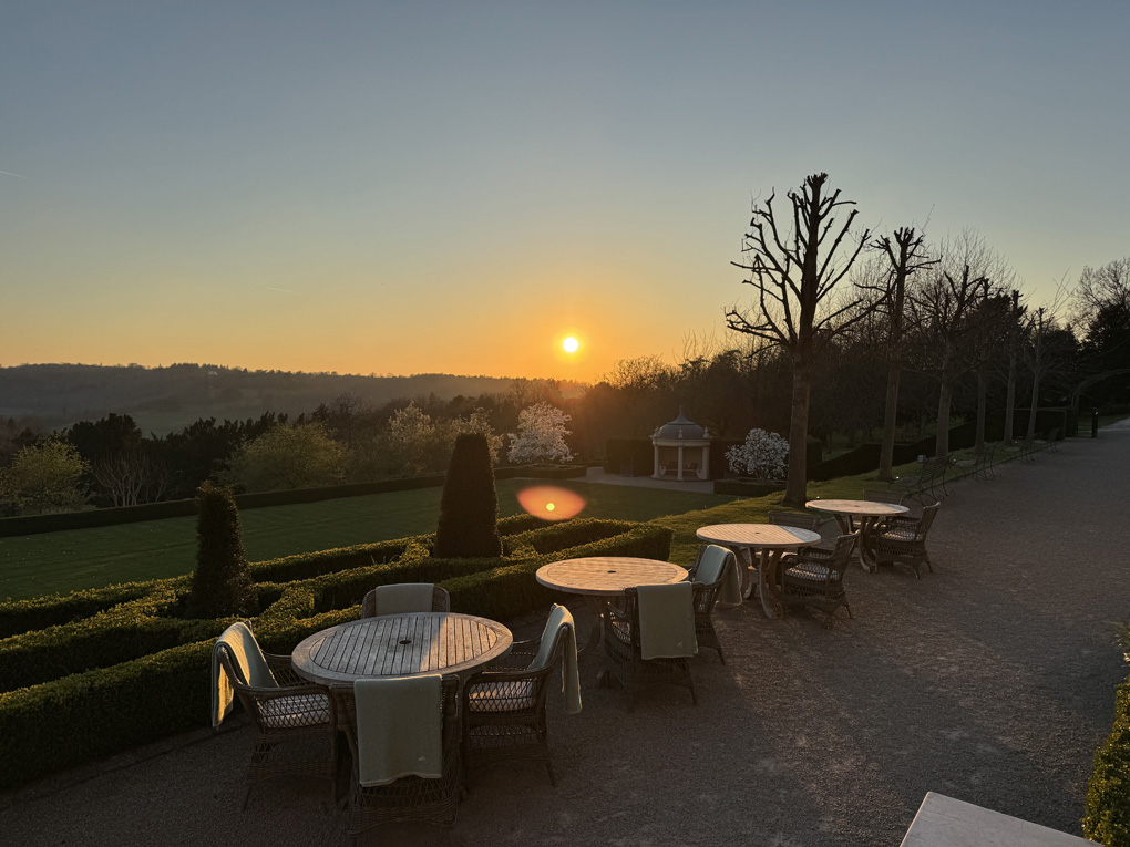Surrey hills at sunset overlooked from a large terrace