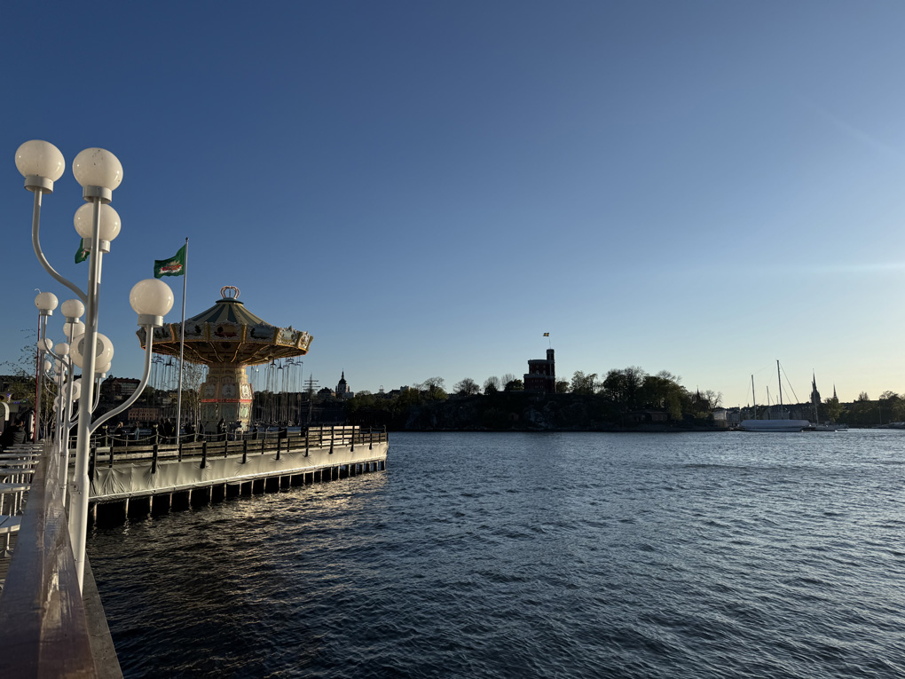 Swings at a fairground on the edge of Stockholm archipelago