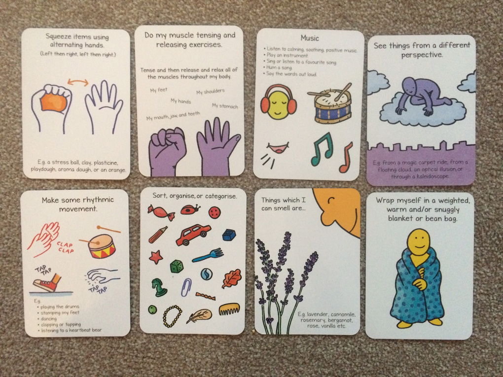 8 cards laid out on the floor, printed with words and drawn images which demonstrate ideas that help a person to regulate their nervous when feeling anxious or worried