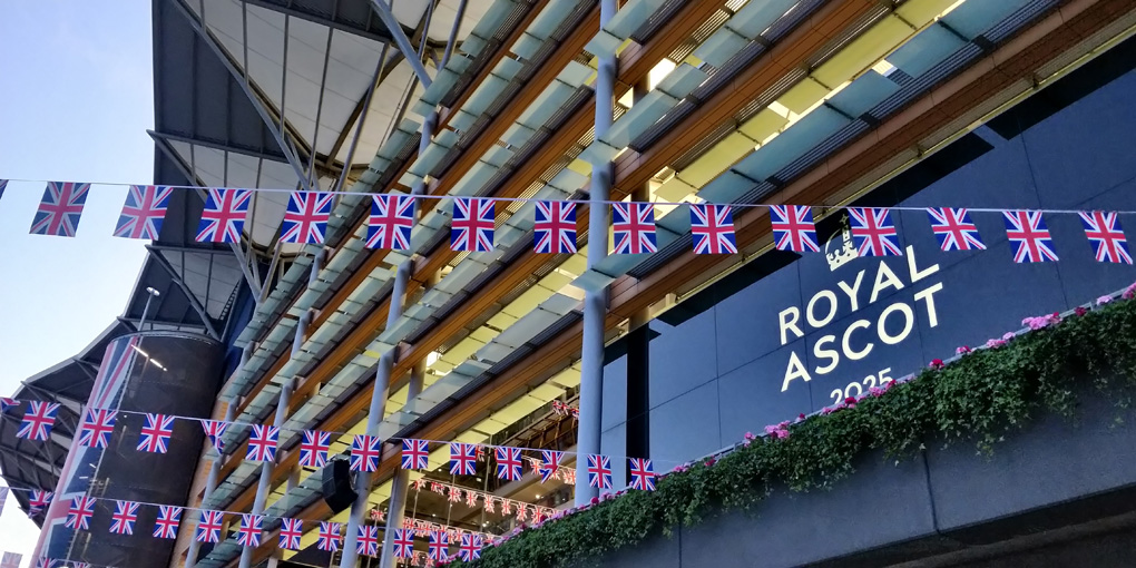 Royal Ascot grandstand with union flag bunting.