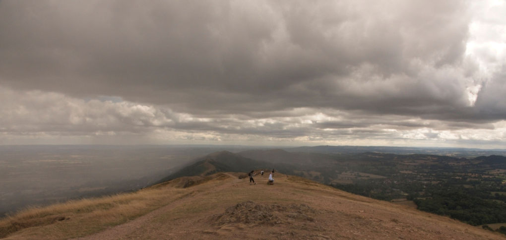 Taken looking along the ridge away from Malvern, wide vista blurred by incoming rain.