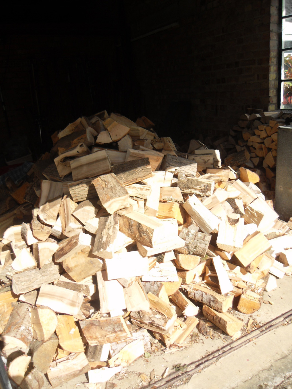 A heap of newly delivered fire logs