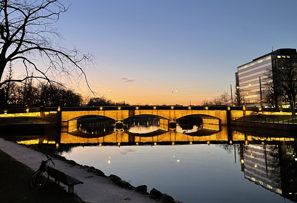 Bridge lit up in the dusk.