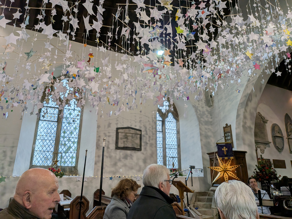 Our new Curate got the village community together to create 10,000 white stars. This was done over two Wednesday before Christmas