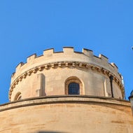 Temple church catching the golden sun on its round tower