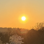 Surrey hills at sunset overlooked from a large terrace
