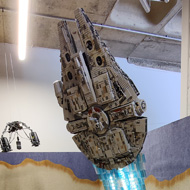 Lego build of Star Wars Mos Eisley space port with Millennium Falcon taking off
