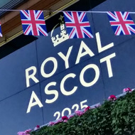 Royal Ascot grandstand with union flag bunting.