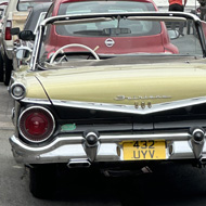 We see the rear of a parked 1959 Ford Sunliner- the caption reads -About to go cruising at the Redhill Dream Cruise