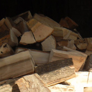 A heap of newly delivered fire logs