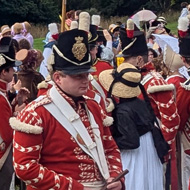 Throng of people dressed in Georgian garb