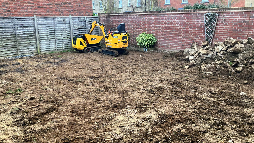 my garden after the digger and mini dump truch have been over it for 1-day! What a brown muddy mess!